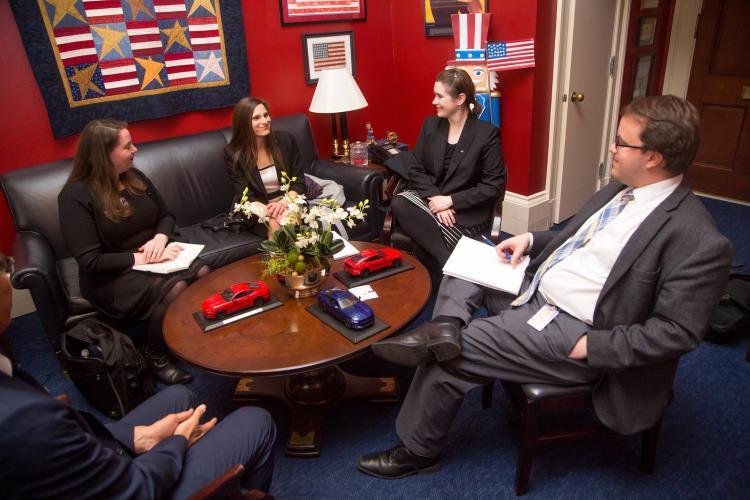 people sitting around a table at a meeting during the 2018 Capitol Hill Day event