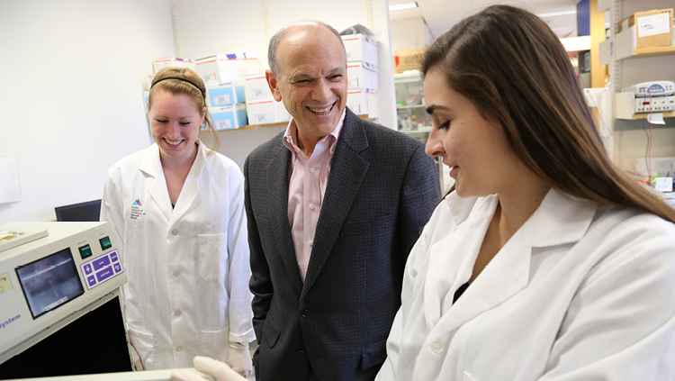 Dr. Eric Nestler in a lab with Associate Researchers Marie Doyle and Dominika Burek