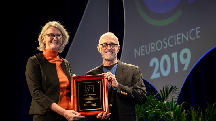 John Rinzel, PhD (right), of New York University, accepts the Swartz Prize for Theoretical and Computational Neuroscience