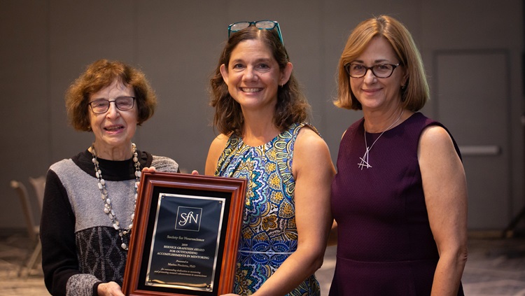Marina Picciotto, PhD (center), of Yale University, is honored with the Bernice Grafstein Award for Outstanding Accomplishments in Mentoring.