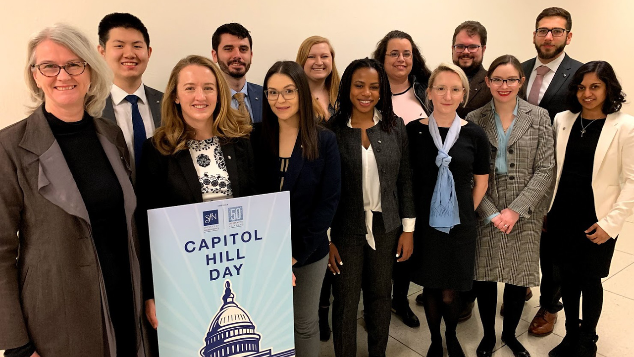 SfN President Diane Lipscombe (left) with the 2019 class of the Early Career Policy Ambassadors Program, a one-year program that allows early career scientists to interact with leading neuroscience advocates and policymakers.