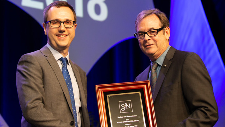 Christopher D. Harvey, PhD, of Harvard Medical School, receives the Young Investigator Award.