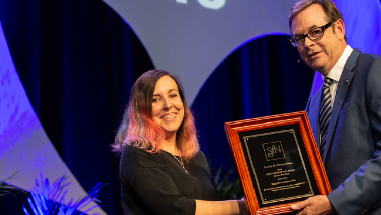 Elena Blanco Suarez, PhD, of the Salk Institute for Biological Studies, accepts the Next Generation Award at the junior faculty level.
